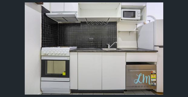 Fully Furnished Studio Apartment - Photo 1