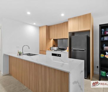 Stylish Near-New Apartment in the Heart of Schofields - Photo 2