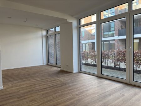 Erstebezug: Schöne Erdgeschosswohnung direkt am Norder Tief! - Photo 2