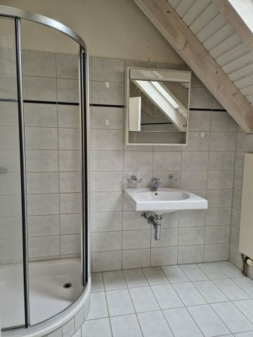 Living in the attic - Photo 3