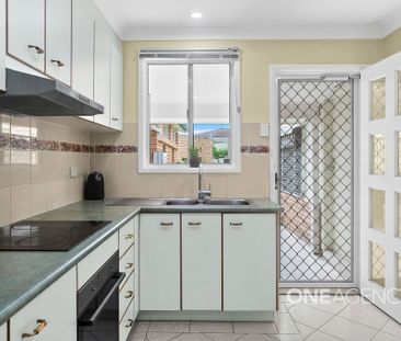 COMFORTABLE FAMILY HOME WITH PRACTICAL FEATURES - Photo 2