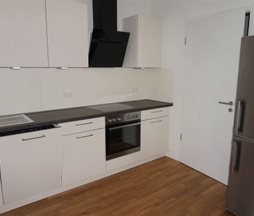 Moderne Erdgeschosswohnung mit Einbauküche und Terrasse! Mit direkt... - Photo 4