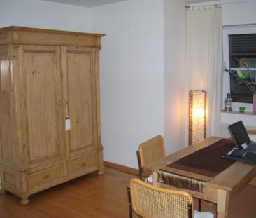 Mehr als nur vier Wände: Wohnen auf zwei Ebenen mit Terrasse und Ga... - Foto 2