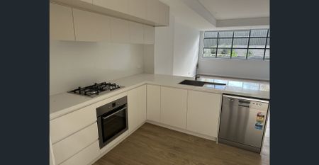 Near new, split level, spacious two bedroom, two bathroom apartment in quiet location only metres from Homebush Train Station - Photo 2