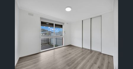 Bright Family Home with Space, Style & Security - Photo 3