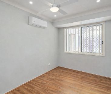 Spacious 4-Bedroom Family Home with Air-Conditioning Throughout - Photo 6