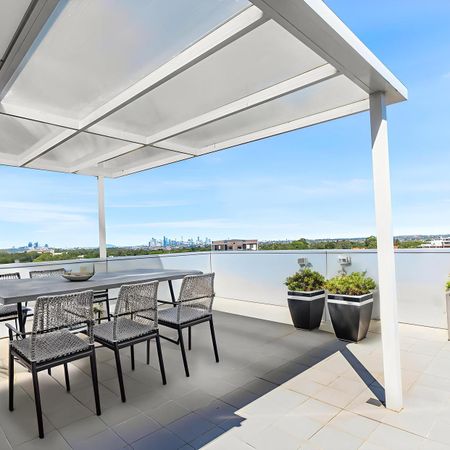 Oversized 3-Bedroom Penthouse with Spectacular City & Distance Views - Photo 4