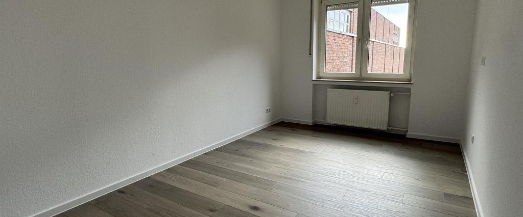 Zentral gelegene Maisonette-Wohnung in der Gütersloher Innenstadt - Photo 1