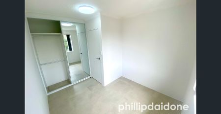 OPPOSITE TRAIN STATION, RENOVATED 2-BEDROOM UNIT - Photo 2