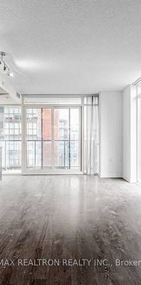 MUST SEE TWO LEVELS QUEEN WEST 1 BED PARKING INCLD - Photo 1