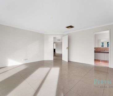Impressive Family Living with Pool, Multiple Living Areas & Triple Garage - Photo 2