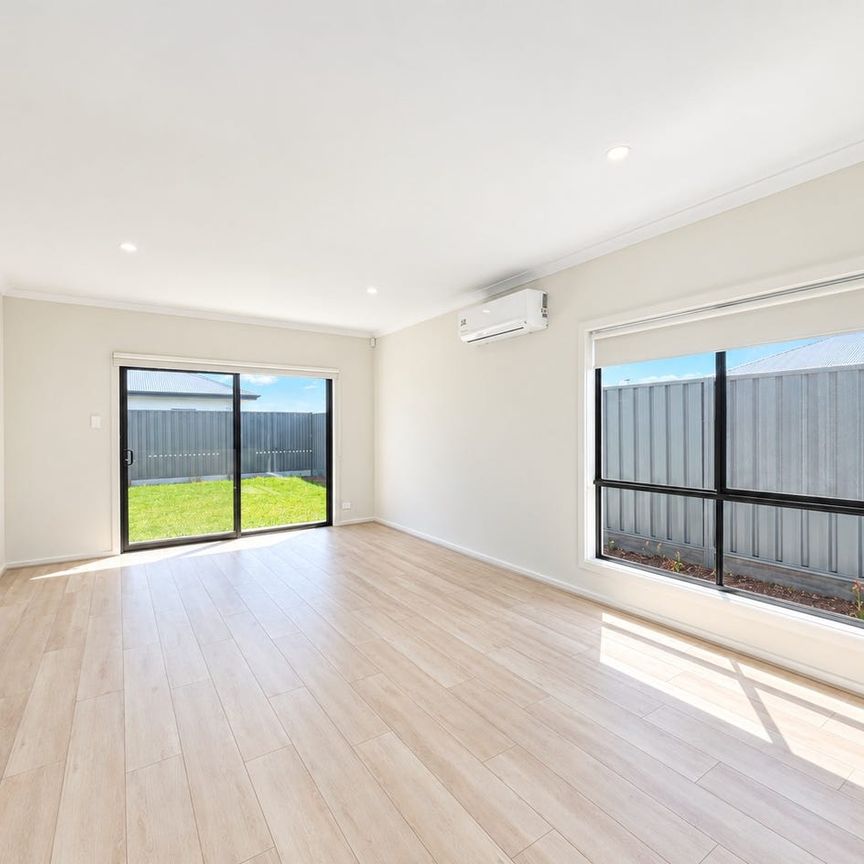 BRAND NEW 4-BEDROOM HOME WITH QUALITY FEATURES - Photo 1