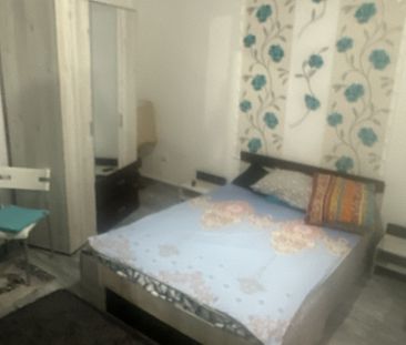 Garsonieră spațioasă cu facilități și grădină - Fotografie 3