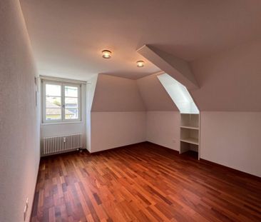 Appartement mansardé de 3,5 pièces avec beaucoup de charme - Photo 3