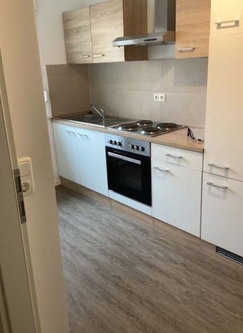 Aufgepasst: 1-Zimmerwohnung mit Einbauküche und schönem Balkon! - Foto 4