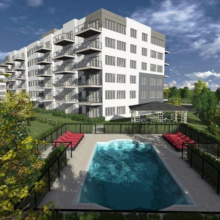 Superbe condo 3 ½ TOUT MEUBLÉ & TOUT INCLUS au Quartier Dix30 à Brossard - Photo 4
