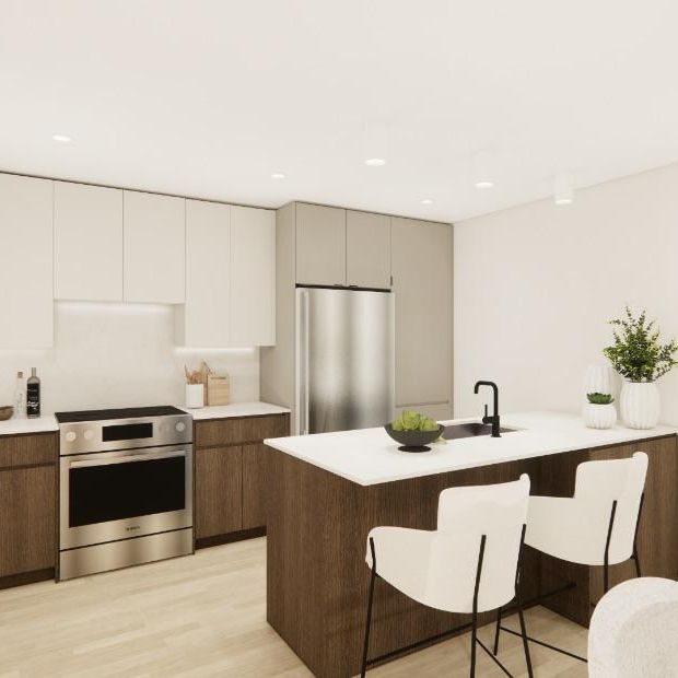 ** Beau grand 4 ½ projet Les Tours de la Gare Mirabel** - Photo 1