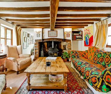 A detached cottage set in over two acres of gardens right in the he... - Photo 1