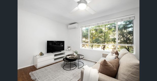Fully renovated security apartment embraced in a tranquil parkside setting - Photo 1