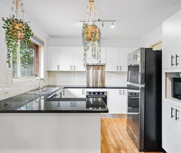 STREET FACING, FEELS LIKE A HOUSE! - Photo 2