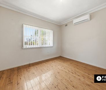 Charming 3-Bedroom Home with Easy Living & Great Location - Photo 6