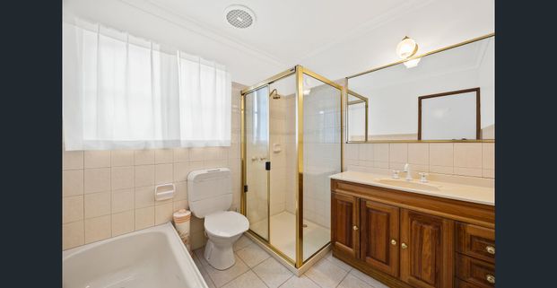 Newly Renovated Family Home in a Peaceful Court Location - Photo 1