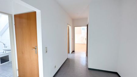 Lichtdurchflutete 3-Zimmer-Dachgeschosswohnung in ruhiger Lage - Foto 4