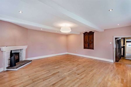 Stylish modernised farmhouse with lovely gardens, well located on the semi-rural outskirts of Wilmslow - Photo 4