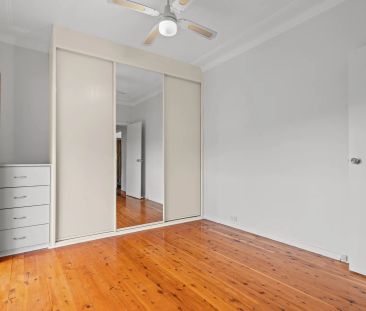 Conveniently Located Cottage with Captivating Water Views - Photo 4