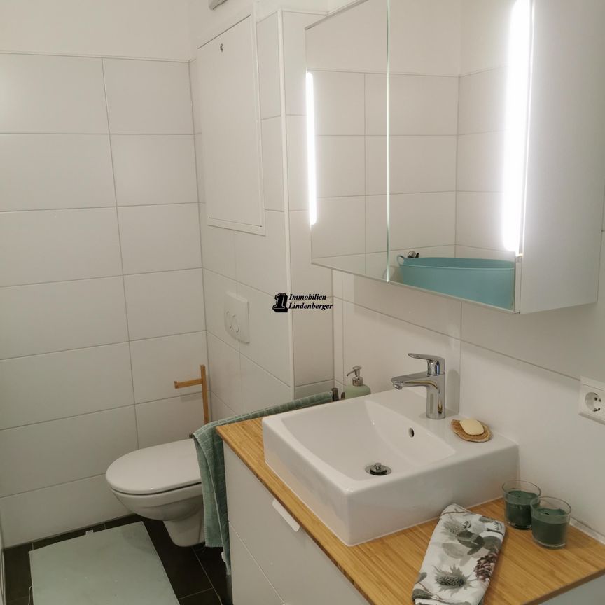 Architektonisch moderne Zweizimmerwohnung mit Caport und PKW-Stellplatz in Pasching - Foto 1