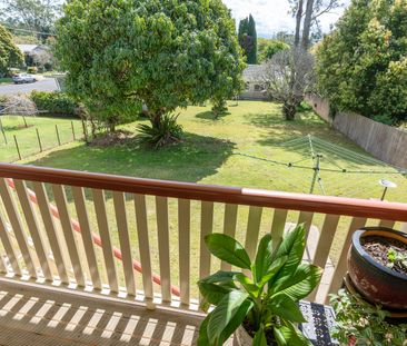 Spacious Family Home with Covered Deck and Convenient Location - Photo 6
