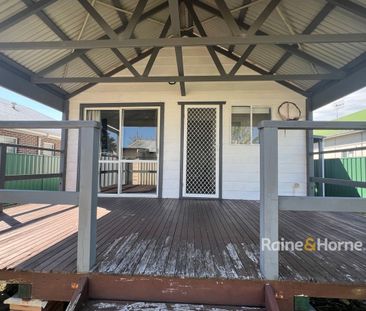 Comfortable Home with Entertaining Deck - Photo 6