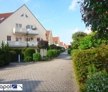 Gemütliche 1-Zi-Wohnung mit Terrasse, kl. Garten und Einbauküche in... - Foto 1