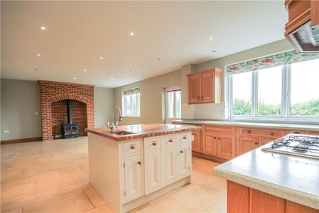 A well presented detached house set in a quiet rural location on the edge of a woodland on the outskirsts of the Village. - Photo 3