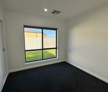 Genuine 4-Bedroom Home - Photo 4
