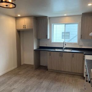 Logement 5 1/2, renové au 1ier étage d'un triplex a Granby - Photo 2