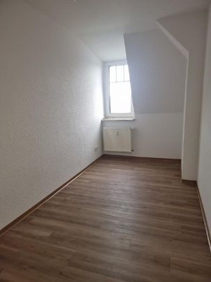 Gemütliche Dachgeschosswohnung in der Südstadt! - Photo 1