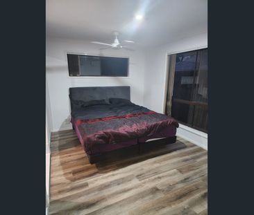 Modern Family Living with Solar, Smart Features & Massive Parking C... - Photo 3