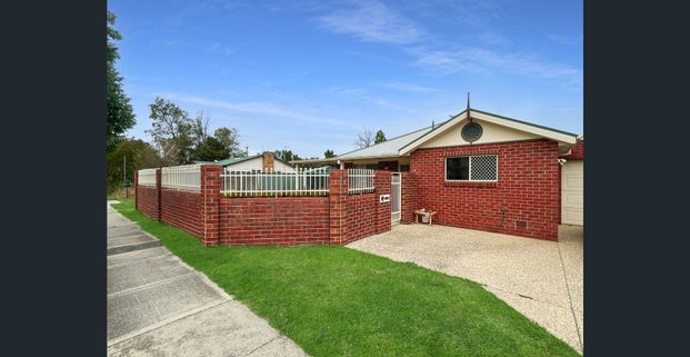 Comfortable & Low-Maintenance Living in a Convenient Location - Photo 1