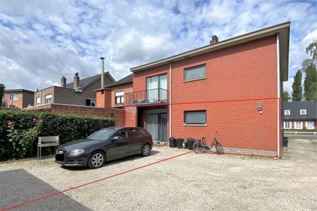 Gelijkvloersapp. met 2 slpk, garage en tuin - Photo 5