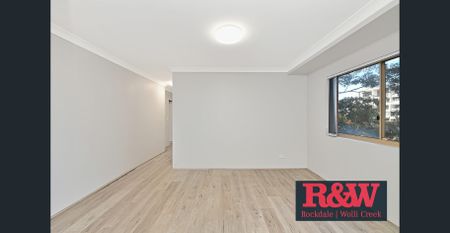 Bright & Modern 2-Bedroom Apartment in the Heart of Rockdale - Photo 4