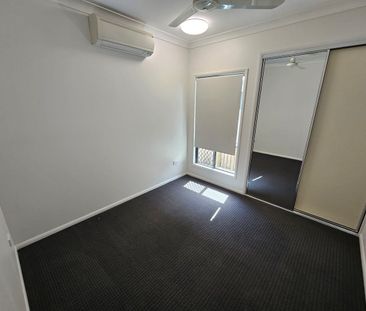 Spacious Four-Bedroom Home with Media Room & Air Conditioning - Photo 3