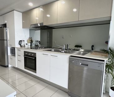 Fully Furnished- Water View, Modern Apartment Living At It's Best - Photo 4