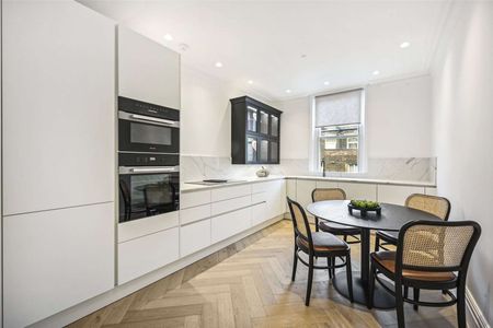 A refurbished top floor Penthouse in this impressive red brick mansion block. - Photo 5