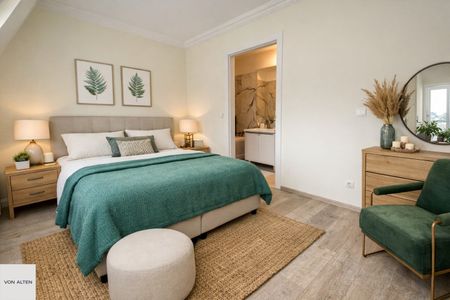 Maisonette-Dachgeschosswohnung mit Lift auf beiden Ebenen, großzügigen Terrassenflächen & Tiefgaragenplatz - Photo 2