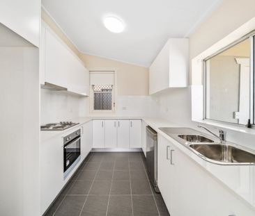 Elevated Freestanding Cottage with Generous Yard - Photo 1