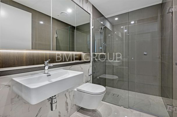 Oversized 2-Bedroom Apartment | Heart of Green Square | Luxury Marble & Resort Living - Photo 1