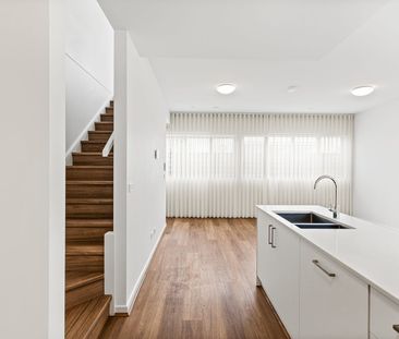 Peaceful Designer Living in Fitzroy North's Best Kept Secret - Photo 1