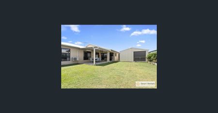 Spacious Family Home with Shed and Multiple Living Areas - Photo 2