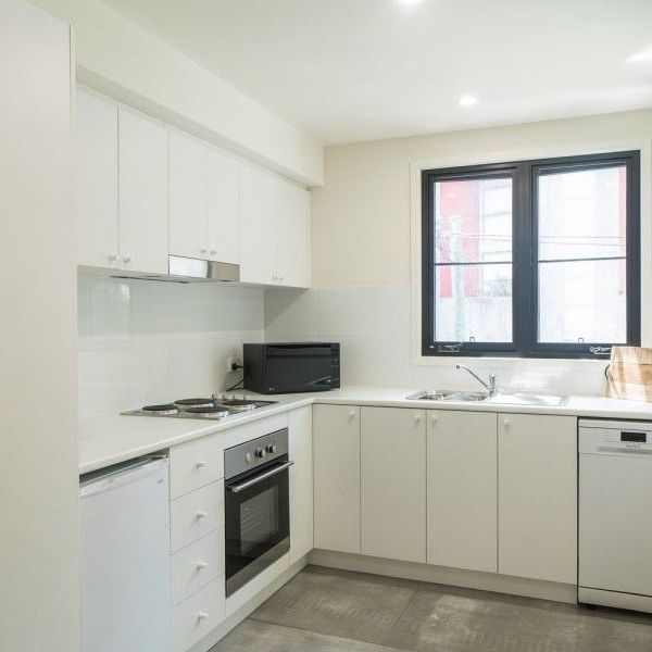 THE GLASS STUDIOS are sleek industrial living and are located in the heart of Newtown. - Photo 1